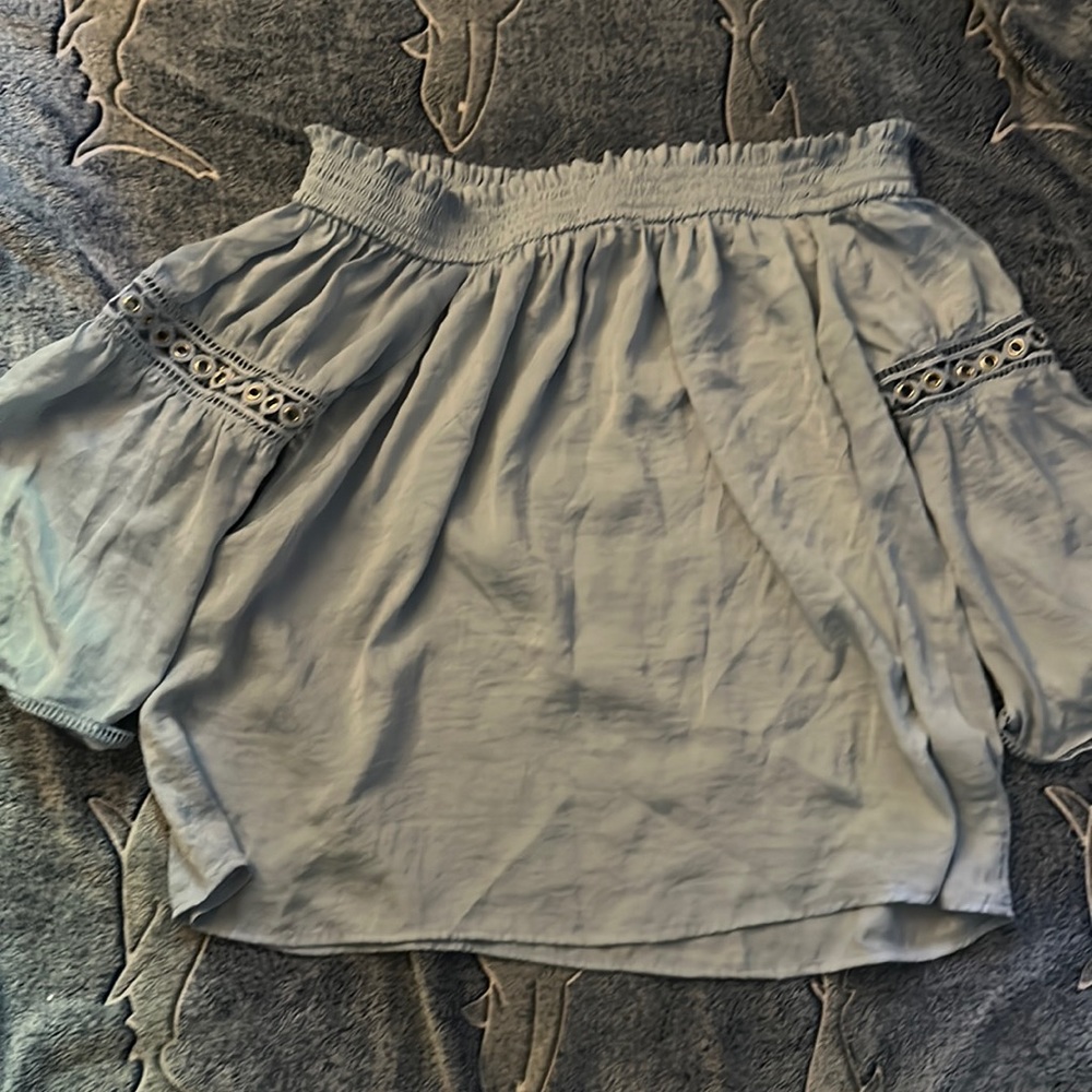 Jennifer Lopez brand light blue blouse